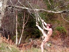 Naked self-bondage in the woods gone wrong.