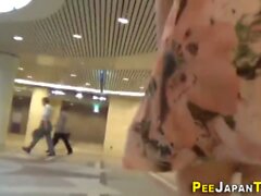 Asian babe pees in public