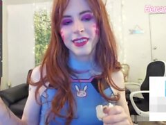 red haired skinny shemale cosplay goddess with a giant cock dances on webcam
