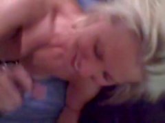 Adorable blonde chick sucks and swallows black cum