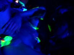 Horny skanks in glow in the dark stockings stuff their pussies with dildos