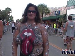 Painted naked sluts parade around the town