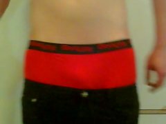 sagging black slim jeans in red boxerbriefs