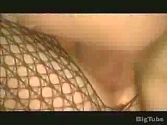 Fishnet blonde gets cummed