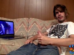 Skinny straight thug jerks off while watching internet porn